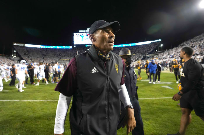 Arizona State Sun Devils head coach Herm Edwards walks off the field after the game against the BYU Cougars.
